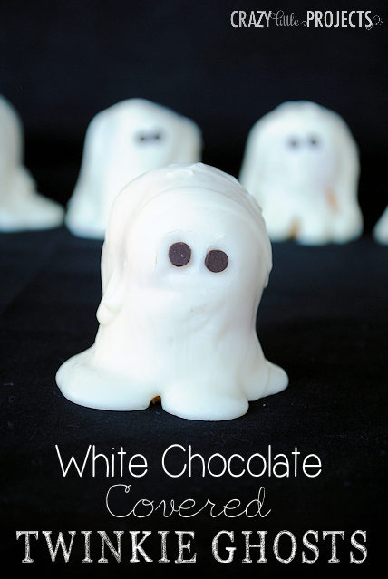 Easy treat for a Halloween party! It's a Twinkie covered in white chocolate...so easy! Crazy Little Projects