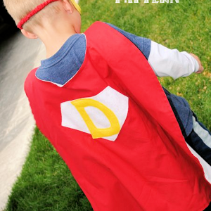Superhero Cape Pattern-This easy to sew superhero cape pattern is going to be a huge hit with the kids! Make this cape for kids with their initial or their favorite superhero symbol in any colors they choose! #kids #sewing #sew #patterns