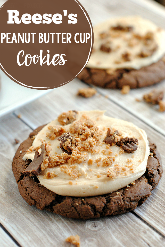 Chocolate Reese's Peanut Butter Cup Cookies-A soft and chewy chocolate cookie topped with peanut butter frosting and crushed Reese's Peanut Butter Cups. This cookie recipe is amazing! #cookie #dessert #dessertrecipe #reeses #peanutbutter