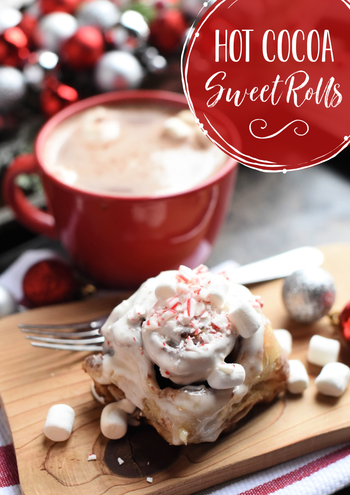 Hot Chocolate Sweet Rolls-These rolls are filled with a warm chocolate and topped with marshmallow icing. Sprinkle crushed peppermint on top for a perfect Christmas breakfast or treat. Made with Rhodes Bake N Serv rolls meaning they are super easy and taste amazing! #christmas #christmasbreakfast #breakfast #dessert #dessertrecipes
